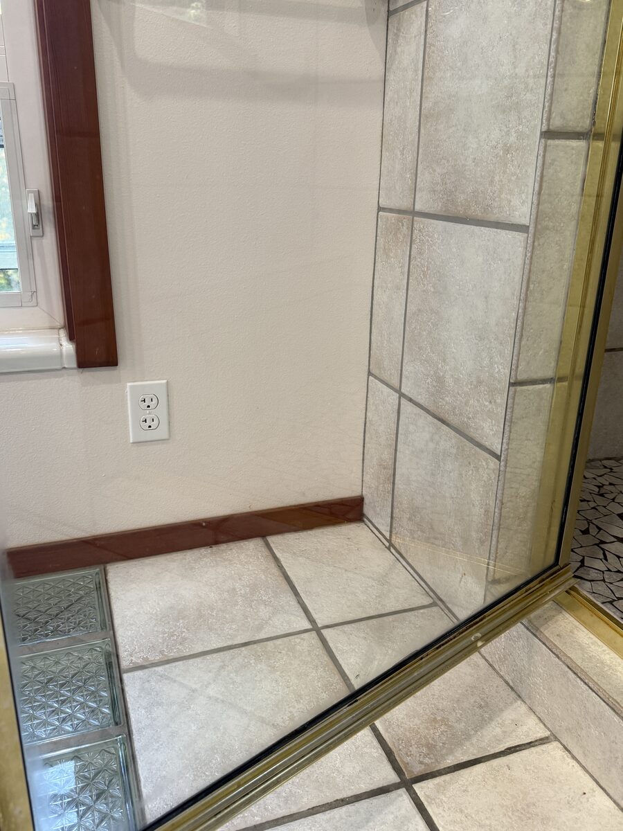 Clean shower tile and glass corner