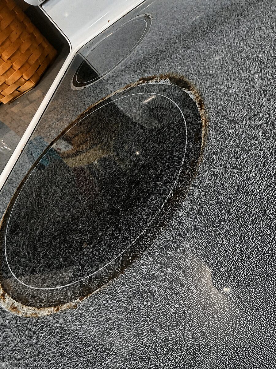 Glass stovetop before cleaning